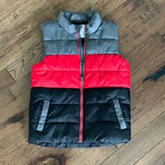 Nwot Boys Sonoma Branded Size 8 Insulated Zipper Vest. Gray Red And Black Striped And In Perfect Condition, Never Worn. Comes From An Indoor Pet Free And Smoke Free Home. Red Color Block Winter Outerwear, Multicolor School Winter Outerwear, Red Outerwear For School In Fall, Red Winter Outerwear For School, Red Casual Outerwear For School, Zipper Vest, Indoor Pets, Kids Jacket, Red And Black