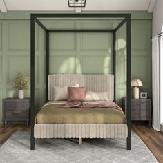 a bedroom with green walls and a four poster bed