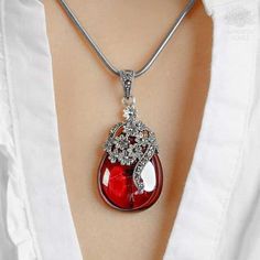 Feeling of Unconditional Love! Connect with the light of heart and love with this Gemstone Necklace - Genuine Plenary Pendant. With this necklace, you will feel encouraged and inspired to spread the universal feeling of love. Soothing Energy Red garnet is not only a stunning gemstone but it also radiates soothing warmth. The stone controls overwhelming emotions and improves sleep quality after a long, tiring day. More Positivity Green chalcedony stone is a type of quartz that absorbs negativity. Crystal Necklaces With Natural Stones For Gift, Teardrop Jeweled Necklace, Heart-shaped Jewel Necklace, Spiritual Jeweled Necklaces, Crystal Round Pendant Necklace As Gift For Her, Vintage Gemstone Heart Pendant Necklace, Bohemian Gemstone Heart Pendant Necklace, Teardrop Pendant Necklace With Stones As Gift, Anniversary Crystal Pendant Necklace