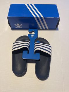 adidas ADILETTE Slide Sandals Beach Flip Flops G16220 Men’s Size 4 Navy White. Condition is New with box. Shipped with USPS Priority Mail. Casual Adidas Slides For Swimming, Casual Adidas Slides For Beach, Adidas Slides With Logo For Beach, Adidas Sporty Flip Flops For Sports, Sports Slides With Adidas Logo And Open Toe, Adidas Logo Slides For Beach, Sporty Adidas Logo Slides With Open Toe, Open Toe Adidas Slides For Sports, Adidas Slides For Swimming With Synthetic Material