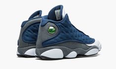 The Air Jordan 13 “Flint 2020” is the 2020 release of the beloved original colorway.  Appearing alongside other original colorways in the late-90s, the “Flint” makeup is one of the most coveted looks of the Jordan 13 despite the fact that it does not employ the team uniform colors of the Chicago Bulls.  Nicknamed after the “Flint Grey” nubuck material that appears on the mudguard, mid-panel, and heel, the shoe features true-to-original styling elements including French Blue ballistic mesh with r Drippy Shoes, Jordan 13 Flint, Jordans Retro, Retro 13, Jordan Shoes Girls, Air Jordan 13 Retro, Retro 11, Jordan Basketball, Fitting Room