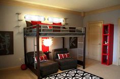 a bunk bed with two couches underneath it in a room that has carpeted flooring