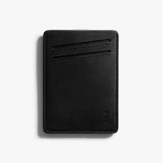 Features: Quick access card slot 2 regular card slots RFID blocking material Money clip Modern Black Card Holder With Interior Slots, Modern Black Rectangular Card Holder, Modern Black Card Holder With Rfid Blocking, Modern Black Card Holder With Card Slots, Classic Black Card Holder For Daily Use, Modern Black Card Holder With Slots, Modern Black Rfid Blocking Card Holder, Minimalist Black Rectangular Card Holder, Modern Black Rectangular Wallets