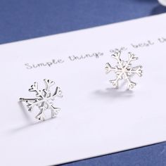 Winter lovers, this snow flake earring is a perfect mix of nature's art with a sterling silver finish. Hypoallergenic and lead-free, the whole art making process is unique to nature's jewelry making so each piece feels life like. This earring will keep you warm all through the winter season. Give your style a wintery persona with these stunning, high polished snow flake earrings. Hand crafted out of sterling silver and set with amazing snow flake crystals, these beautiful earrings will be the pe Sterling Silver Snowflake Jewelry For Winter, Silver Jewelry Christmas Gift For Her, Winter Gift Drop Earrings, Sterling Silver Snowflake Jewelry, Silver Jewelry As Winter Gift, Silver Jewelry For Winter Gift, Elegant Winter Gift Earrings, Sterling Silver Jewelry For Winter Gifts, Nickel-free Sterling Silver Christmas Earrings