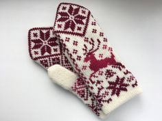 These double wool mittens with deer pattern are an ideal winter accessory. These mittens are super warm, as there is an extra woolen layer on the inside. All wool items in my shop are washed, which makes the yarn softer. Material: 100% wool Size: *Medium - medium size women Hand circumference (measure at widest part): 19-20 cm (7.48-7.87 in) *Small - big child or small female size Hand circumference (measure at widest part): 17-18 cm (6.69-7.09 in) Colour: *White/Red Care: *You can wash this ite Deer Pattern, Wool Mittens, Machine Pattern, Knit Mittens, 30 Gifts, Knitting Women, Winter Accessories, Double Knitting, Winter Glove