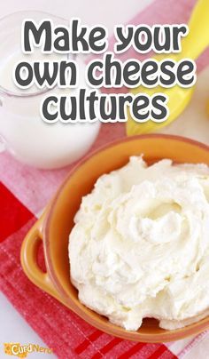 a bowl filled with whipped cream sitting on top of a red and white checkered table cloth