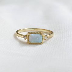 S925 Gold Opal Dainty Rectangle Ring Brand New To Our In House Collection. Features An S925 Sterling Silver Stamps, Gold Plating, Gorgeous Rectangle Opal Center, And Dainty White Cz Diamonds On Each Side. Comes With Little Black* Gift Box. 5220 Rectangle Dainty Engagement Ring, Rectangular Sterling Silver Crystal Ring As Gift, Elegant Rectangular Opal Ring, Square Gemstone Promise Ring, Elegant Sterling Silver Square Rings, Elegant Rectangular Birthstone Promise Ring, Elegant Rectangular Gemstone Birthstone Ring, Opal Ring Vintage, Luxury Wedding Rings