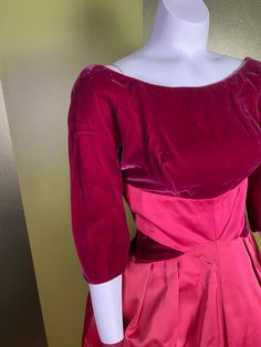 "Gorgeous velvet and satin Kay Selig gown with bubble skirt. Color is hard to capture: I'd call it a deep raspberry color. Stiff skirt, lined with heavy interfacing. Velvet on one shoulder has a small pressed spot. I have not tried steaming to get wrinkles out Women's xs 34\" bust 24\" waist Skirt length: 27\"" Vintage Velvet Wedding Dress, Fitted Retro Satin Dresses, Vintage Satin Evening Dress, Fitted Velvet Ball Gown, Retro Fitted Satin Dress, Vintage Ball Gown Dresses For Gala, Vintage Dress With Pleated Bodice For Gala, Vintage Evening Dress With Boned Bodice, Vintage Satin Cocktail Dress