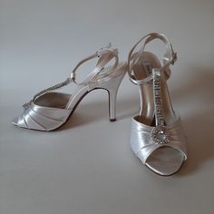 These Gorgeous White Bridal Heels Have A Rhinestone Strap With A Teardrop Accent. These Have Never Been Worn. Heel Height 10 Cm/ 4" Elegant Bedazzled Heels For Wedding, Fitted Open Toe Wedding Shoes With Rhinestones, Silver Wedding Shoes With Rhinestones For Reception, Silver Rhinestone Wedding Shoes For Reception, Formal Fitted Wedding Shoes With Rhinestones, Elegant Rhinestone Wedding Shoes For Reception, Elegant Bedazzled White Wedding Shoes, Elegant Rhinestone Wedding Shoes, Elegant Rhinestone Wedding Reception Shoes