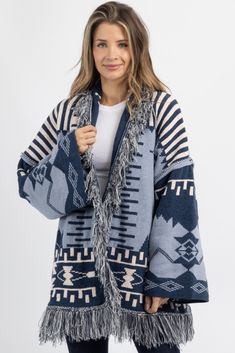 Bohemian Winter Outerwear In Relaxed Fit, Bohemian Relaxed Fit Winter Outerwear, Blue Jacquard Knit Outerwear For Fall, Blue Fair Isle Pattern Outerwear For Fall, Blue Fair Isle Outerwear For Fall, Blue Fair Isle Pattern Fall Outerwear, Blue Bohemian Sweater For Layering, Blue Nordic Long Sleeve Outerwear, Blue Long Sleeve Outerwear With Fair Isle Pattern