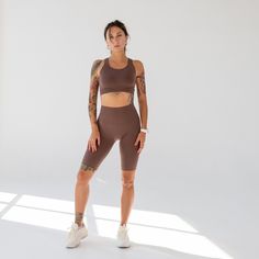 "Welcome to our Mandarinclothing shop, where style and functionality unite seamlessly! 💫 Introducing our premium brown seamless microfiber track shorts with a high waist, the epitome of versatile activewear designed to elevate your sports performance and your everyday casual looks. ️ These track shorts are meticulously crafted with your comfort and style in mind. Whether you're hitting the track, headed to the gym, or simply embracing a sporty and chic look for your daily activities, these shorts have got you covered. Key Features: ✨ Seamless design for unbeatable comfort and a sleek look. ️ Ideal for sports, workouts, or casual wear. 👖 High waist for enhanced support, coverage, and a flattering fit. 💧 Moisture-wicking technology keeps you fresh and dry. 🌱 Ethically produced with a com Brown Athleisure Activewear With Built-in Shorts, Brown Stretch Mid-thigh Shorts, Brown Seamless Stretch Activewear, Brown Stretch Mid-thigh Length Shorts, Stretch Brown Mid-thigh Length Shorts, Brown Seamless Activewear, Sporty Stretch Athletic Shorts In Brown, Sporty Seamless Brown Activewear, Sporty Stretch Brown Athletic Shorts