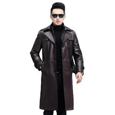 Looking to elevate your winter comfort and style? Your search ends here with this essential trench coat. Meticulously crafted from premium-grade cow leather, this long coat is your go-to option for casual occasions. Its double-layer collar and loose fit not only provide warmth but also exude a fashionable charm. The attractive button embellishments effortlessly create a chic and laid-back style. Solid Leather Winter Outerwear, Winter Leather Outerwear, Leather Long Coat For Fall, Classic Long Leather Pea Coat, Single Breasted Leather Long Coat, Single Breasted Long Leather Coat, Winter Business Long Leather Coat, Classic Long Brown Outerwear, Classic Long Leather Coat For Fall