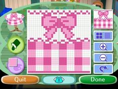 a pink and white checkered pattern on a computer screen with other items around it