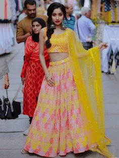 This exquisite ensemble features a yellow color organza lehenga adorned with digital print work, sequins, and thread embroidery work, creating a contemporary and elegant look. The similar color slub silk choli is embellished with sequins, thread embroidery work, and mirror work, adding a touch of glamour to the outfit. Completing the look is a similar color organza dupatta with sequins and thread embroidered work, along with a designer lace borderwork for a stylish finish.
The semi-stitched lehe Yellow Chanderi Palazzo Set For Party, Multicolor Chanderi Palazzo Set For Party, Yellow Lehenga With Zari Work For Festival, Yellow Salwar Kameez With Pallu For Party, Yellow Choli With Resham Embroidery For Party, Festival Yellow Lehenga With Zari Work, Party Choli With Resham Embroidery In Yellow, Party Yellow Choli With Resham Embroidery, Yellow Georgette Sets For Diwali