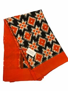 Double Ikkat Telia Rumal Handwoven Designer Cotton Saree in Black/Orange (with Blouse) Orange Cotton Silk Dupatta For Navratri, Orange Handloom Blouse Piece For Navratri, Traditional Fitted Orange Saree, Orange Chanderi Handloom Blouse Piece, Orange Handloom Blouse Piece In Traditional Drape, Traditional Orange Handloom Blouse Piece, Traditional Handloom Orange Blouse Piece, Traditional Drape Handloom Orange Blouse Piece, Traditional Drape Orange Handloom Blouse Piece