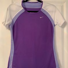 Never Worn. Brand New Purple Crew Neck T-shirt For Workout, Nike Purple Crew Neck T-shirt, Purple Crew Neck Sports Top, Purple Sporty T-shirt For Workout, Purple Short Sleeve Athleisure T-shirt, Nike Purple Sporty Tops, Purple Nike Sporty Top, Nike Sporty Purple Top, Stretch Purple T-shirt For Sports