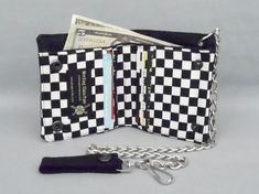 "MADE TO ORDER vegan, black canvas bi-fold chain wallet features pockets made with 100% cotton black and white checkered fabric. 6 card pockets made with cotton fabric 1 large bill pocket made with heavy duty black canvas Closes securely with two gunmetal snaps Black canvas belt loop with a clip for your keys Detachable 16\" silver chain WITHOUT CHAIN OPTION: Wallets are made with the eyelet for attaching a chain. If you add your own chain, DO NOT use a large clip, key ring, or heavy weight chai Anime Wallet, Skate Punk, Rude Girl, Rock And Roll Fashion, Fun Wallets, Skater Punk, Large Crossbody Bags, Rude Boy, Heavy Chain