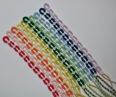 there are many beads that have been made to look like the colors of the rainbow