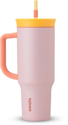 a pink and yellow travel mug with a straw sticking out of the cup's lid