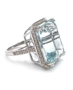 14K White Gold Ring with 62 Round Diamonds 0.52 carat and One Center Step Cut Emerald Shape Aquamarine 23.94 carats. White Gold Aquamarine Ring, Platinum Diamond Rings, Family Jewels, Step Cut, Aquamarine Rings, Platinum Ring, 14k White Gold Ring, White Gold Ring, White Gold Rings