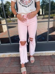 Adorable Pink washed denim jeans with distressed knees and a 27.5" inseam. 92% Cotton 6% Polyester 2% Spandex Model is 5'4" with a 25" waist, 32" hips, and 32" bust wearing a 1. Light Pink Jeans Outfit, Pink Jeans Outfit, Pink Ripped Jeans, New Look Clothes, 2024 Clothes, Light Pink Jeans, Writing Tattoos, Pink Denim, Shorts Sweatpants