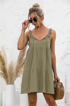 This summer tunic dress is perfect to dress up or down depending on your day. Easily pair this dress with your favorite leather sandals and summer accessories. MEASUREMENTS: Small - Chest & Waist: 35"-37"inMedium - Chest & Waist: 37"-39"inLarge - Chest & Waist: 39"-41"inXL- Chest & Waist: 41"-43"in Chic V-neck Sundress For Summer Outings, Casual V-neck Sundress For Summer Outings, Casual Summer Mini Dress For Summer Outings, Summer Mini Dress For Outing, Summer Outing Mini Dress, Casual Midi Dress For Spring Outing, Spring Sundress For Outing, Chic Ruffled Sundress For Summer Outings, Casual Ruffled Dresses For Summer Outings