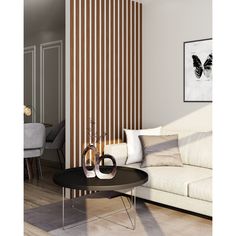 a living room scene with focus on the coffee table and striped wall paper behind it