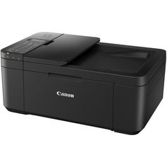 the canon printer is sitting on top of a white surface and it's black