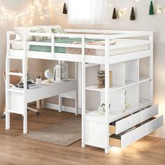 a white loft bed with desk underneath it and christmas lights on the wall behind it