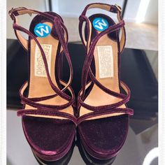 Brand New Salvatore Ferragamo Burgundy/Plum Embroidery Velvet Sandals. Never Wore. Sleek Gold Buckle Along The Back And Burgundy Velvet In Front. Very Beautiful And Finessed Embroidery Detail Among The Heels. The Original Price Is Very Expensive S775, And Two Sizes Are Available. Size 6c Has A Wider Sole Than Size 6b. B Is The Standard Sole Size In The Us. I Got Them From The. Nordstrom Rack, No Dust Bag, And Original Shoe Box, But I Will Ship It With A Very Good Quality Shoe Box. Elegant Burgundy Sandals For Party, Formal Burgundy Ankle Strap Sandals, Elegant Purple Sandals With Branded Heel, Designer Purple Sandals For Formal Occasions, Elegant Purple Block Heel Sandals, Elegant Purple Sandals With Round Toe, Plum Embroidery, Black Espadrilles Wedges, Velvet Sandals