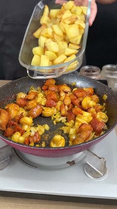 the food is being cooked in the pan on the stove top, ready to be eaten