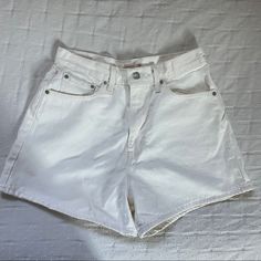 Condition: New Without Tags! Never Been Worn Product Details: - Levi’s Brand - Very High Waisted - Not See Through! Thicker More Rigid Denim - Looser Fit On Legs - Size 29 (Fits True To Size) White High Waist Jean Shorts With Belt Loops, White Shorts With Belt Loops, White Short Bottoms With Belt Loops, White Short Length Bottoms With Belt Loops, Trendy White Jeans With Built-in Shorts, White Cotton Jean Shorts With Belt Loops, White Denim Bottoms With Belt Loops, White Mid-rise Jeans With Built-in Shorts, Casual White Jean Shorts With Belt Loops