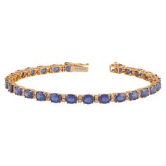 11.60 Carat Sapphire and Diamond Bracelet in 18K Gold This magnificent Oval shape sapphire tennis bracelet is incredulous. The solitaire Oval-shaped Oval-cut sapphires are beautifully With Single Diamonds making the bracelet more graceful and adding depth. Details of the piece: Diamond: 0.58 carats Sapphire: 11.60 carats Size - 6.75 Inch's Note: The width and size of the bracelet can be changed. This piece can be made in any color of gold. Sapphire Tennis Bracelet, Tennis Bracelet, Oval Shape, Link Bracelets, Diamond Bracelet, 18k Gold, Jewelry Bracelets, Tennis, Sapphire