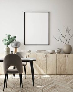 a dining room with white walls and wooden flooring