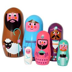 an assortment of russian nesting dolls on a white background