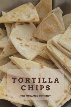 tortilla chips in a bowl with the words tortilla chips