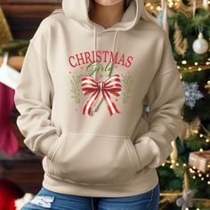 | Christmas Girly Hoodies, Christmas Coquette Bow Shirt, Red Bow Christmas Shirt, Christmas Sweater, Holiday Season, Christmas Shirt Gift | Not every color is available for each type of model, drop down comes automatically with every color but they are not available for each item, therefore, we will let you know if your order includes an unavailable color, so you'll be able to select from what's available. Thank you for being our valued customer! Red Long Sleeve Christmas Hoodie, Christmas Cotton Hoodie Top, Red Bow Christmas, Christmas Coquette, Bow Shirt, Bow Christmas, Bow Shirts, Coquette Bow, Red Bow