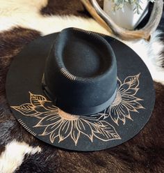 Color- Black Freehand burned hat Women's One Size Adjustable inner drawstring  4" brim Stiff brim 100% wool *All Sales Final Handmade Black Felt Hat For Rodeo, Black Handmade Felt Hat For Rodeo, Handmade Black Western Felt Hat, Artisan Black Felt Hat With Flat Brim, Handmade Black Felt Hat With Flat Brim, Handmade Black Fedora For Rodeo, Artisan Black Hat With Flat Brim, Black Artisan Felt Hat With Short Brim, Black Artisan Felt Hat With Wide Brim