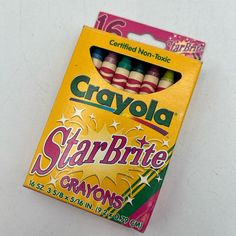 two crayons are sitting in a box