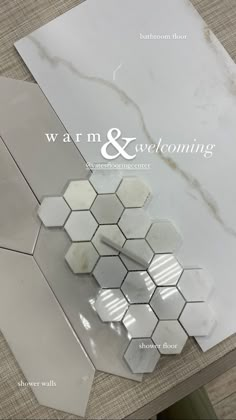 the front cover of a magazine with marble tiles and hexagonals on it