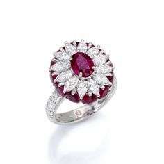 18K White Gold Ruby Diamond Ring Cluster of diamonds ring with ruby on the center Reference: 2B828R RUB=4.00 dia=2.22 Luxury Ruby Cluster Ring With Diamonds, Luxury Cluster Ruby Ring With Diamonds, Luxury Ruby Cluster Ring, Luxury Ruby Cluster Ring With Center Stone, Luxury Cluster Ruby Ring With Center Stone, Exquisite Gia Certified Ruby Diamond Ring, Luxury Red Cluster Diamond Ring, Luxury Lab-created Ruby Ring, Luxury Ruby Ring With Brilliant Cut In Diamond White