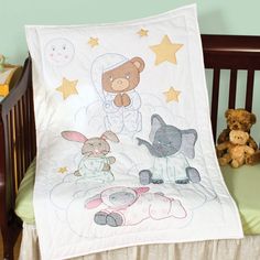 a baby crib with a teddy bear and other animals on it