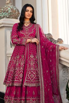 Shocking Pink Pakistani Wedding Dress Double Layered Frock with Lehenga comes with Pakistani raw silk tunic which is embellished with embroidered borders and sequins. There is a richly embroidered dupatta which has sequin work on it. Detailed Description: SKU: WB420 Detailing: Embroidery, Motifs, Naqshi, Sequins, Tilla Color: Shocking Pink Fabric: Net, Tissue, Cotton Silk Design: Fully Embellished Dress with Embroidery, Goldwork Event: Bridal wear, Wedding Pink Pakistani Wedding Dress, Frock With Lehenga, Layered Frock, Pink Bridal Dress, Bridal Lehenga Pakistani, Embroidery Goldwork, Pink Bridal Lehenga, Wedding Dresses Pakistani, Desi Dress