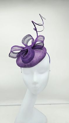 Elegant beautiful purple Fascinator! Classic style to go with a variety of outfits: bridesmaids,  cocktail party,  Kentucky Derby, Rehearsal dinner, Easter and church outfits.  Ones with hair clip and headband. Check our colors.  - Headband and hairclip  - Ready to ship  - Lightweight - Free Shipping - Fast shipping - Customize by adding different color flowers and or feathers Check my store for styles and colors.  Hatsandpearls.etsy.com Find more at my website: Www.hatsandpearls.com  Reach out to me if you can't find what you are looking for.  I can make cake custom orders and help you style and match your outfit  Tag and share your pictures when you wear and style our hats.  Instagram: @hats_pearls Facebook: Hats Pearls Thank you for visiting and happy shopping! Fitted Purple Hat With Short Brim, Elegant Purple Hats For Spring, Elegant Adjustable Fascinator As A Gift, Elegant Purple Hat For Spring, Purple Short Brim Top Hat For Summer, Fitted Purple Hat For Kentucky Derby, Fitted Round Crown Headpiece For Weddings, Fitted Wedding Headpiece With Round Crown, Elegant Purple Headpieces As Gift