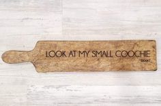 a wooden sign that says, look at my small cooche good on it