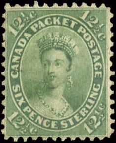 an old postage stamp with the image of queen elizabeth, on it's face