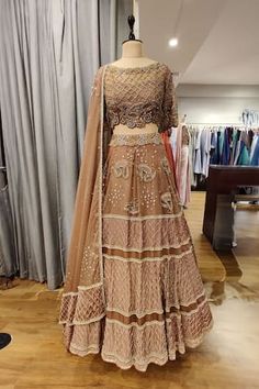 Copper attached cancan lehenga featuring sequin, glass bead hand embroidery in paisley and geometric pattern. Paired with an embroidered, padded blouse and a dupatta. - Aza Fashions Festive Designer Hand Embellished Choli, Navratri Semi-stitched Hand Embellished Choli, Navratri Hand Embellished Semi-stitched Choli, Unstitched Hand Embellished Lehenga For Reception, Semi-stitched Hand Embellished Lehenga For Eid, Hand Embellished Semi-stitched Lehenga For Eid, Hand Embellished Choli For Diwali Designer Wear, Bollywood Style Unstitched Hand Embellished Lehenga, Traditional Hand Embellished Georgette Choli