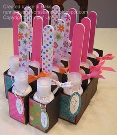 an assortment of toothbrushes in boxes on a table