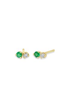 Prong-set emeralds and diamonds shine side by side in these beautiful stud earrings set in 14-karat gold. 1/4" drop Total diamond weight: 0.06ct. Color: F–G Clarity: SI2 14k gold/emerald/diamond Made in the USA >Diamond Guide Yellow Gold Diamond Earrings With Birthstone, Emerald Yellow Gold Diamond Earrings Fine Jewelry, Emerald Yellow Gold Diamond Earrings, Gold Diamond Earrings For May Birthstone, Green Diamond Earrings In Fine Jewelry Style, Green Diamond Earrings Fine Jewelry, Gold Emerald Earrings With Brilliant Cut, Green Diamond Earrings With Diamond Accents, Classic Green Diamond Earrings With Accents