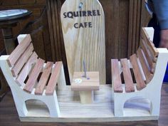 a wooden bench and chair made out of wood